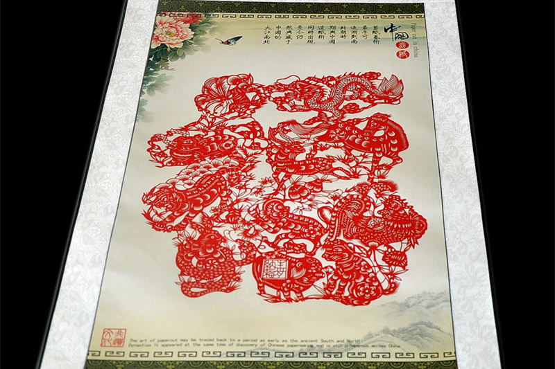 傳統(tǒng)特色剪紙卷軸畫“?！弊旨兪止ぜ艏? /></a></div><a href=