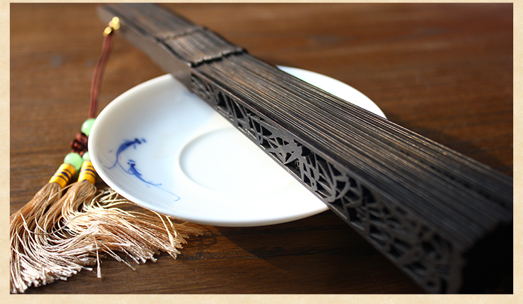 中國(guó)風(fēng)雕花黑檀烏木折扇圖片